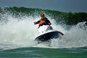 Jetski Hire Auckland - Girl on a jet ski in the Hauraki Gulf